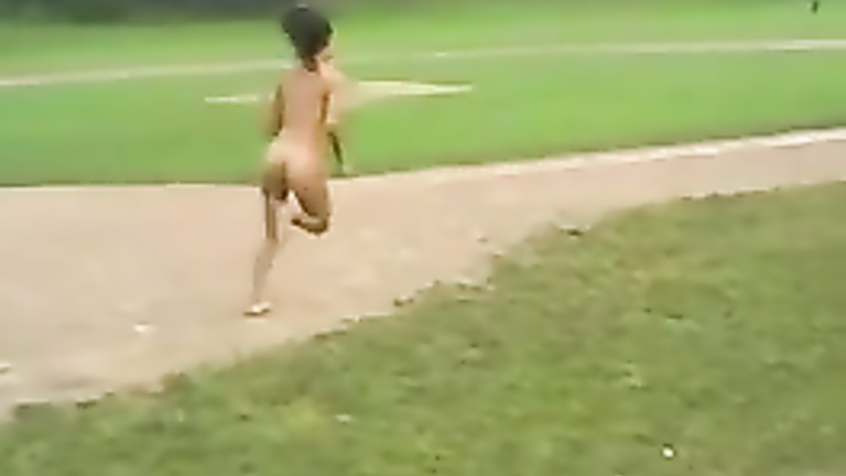 My girl lost a bet and runs naked around the baseball diamond voyeurstyle pic
