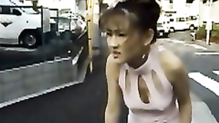 Asian woman pooping her pantyhose in public