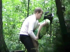 Drunken friends have a quick doggystyle coitus in the woods
