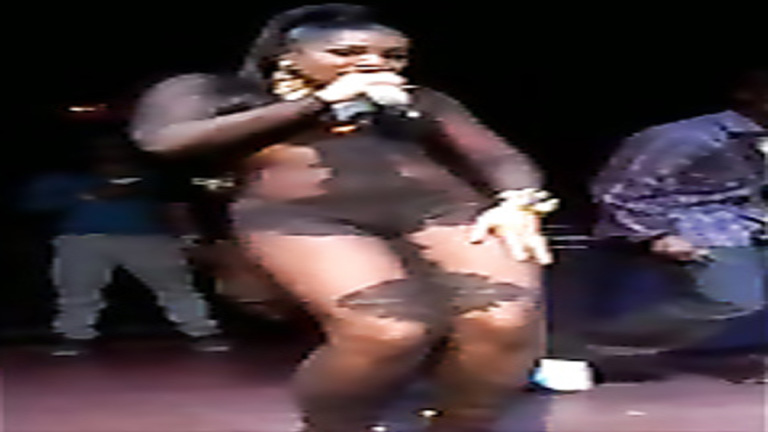 Beautiful popular singer on stage in mostly sheer lingerie