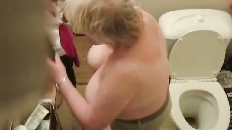 Ceiling camera footage of topless granny with huge tits