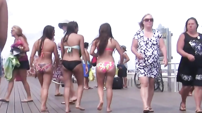 Three cuties with big asses on the boardwalk