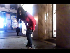 Drunken cutie pissing on a public sidewalk