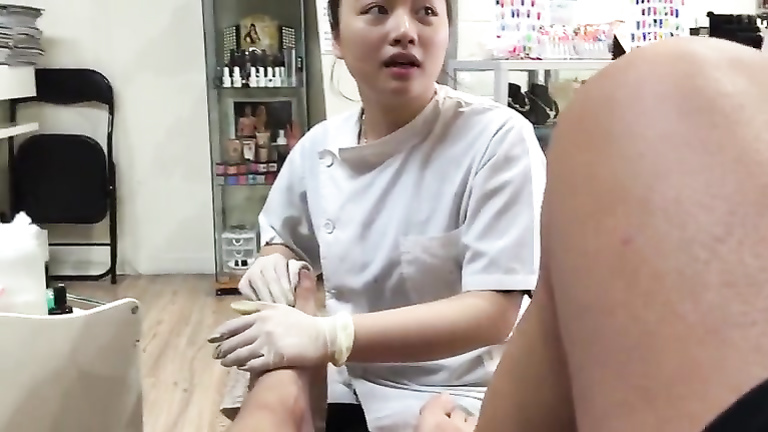 Ejaculating during a pedicure from an Asian girl