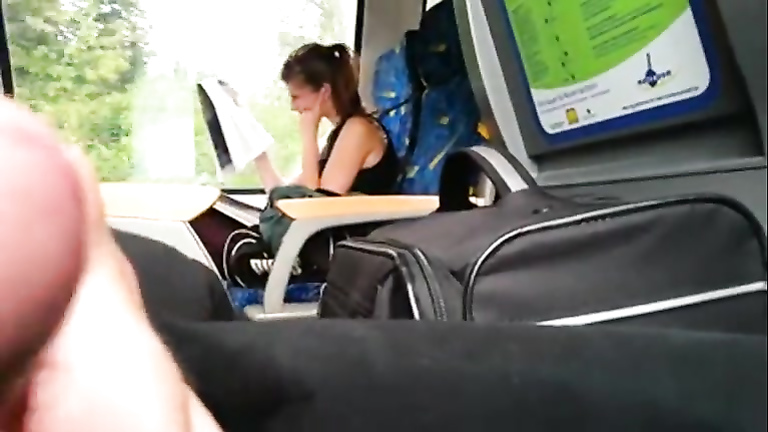 Slowly stroking his dick on the public bus