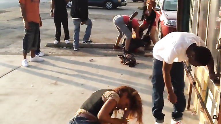 College girls fight on the middle of the street