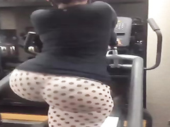 Sporty girl works out with a big ass in spandex pants