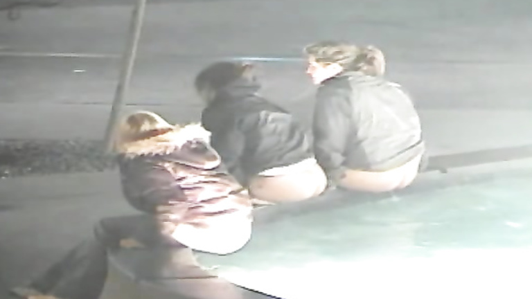 Three stoned girls peeing in a public fountain