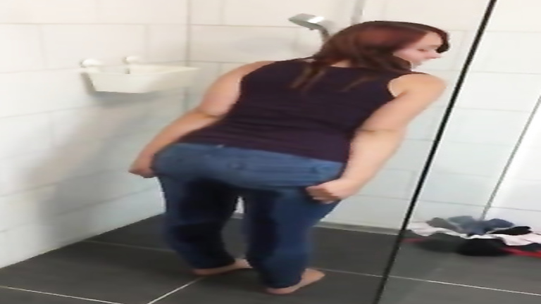 Cute ginger chick pisses her jeans and soaks them