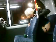 Drunk blonde madam pissing in the back of the bus