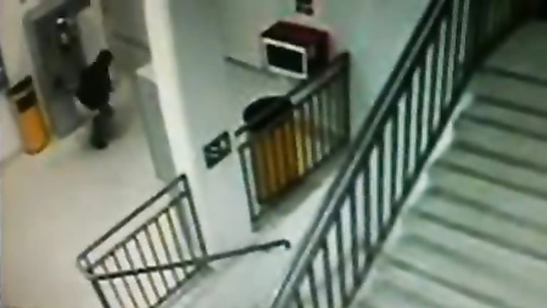 Desperate girl peeing on the floor on security cam footage