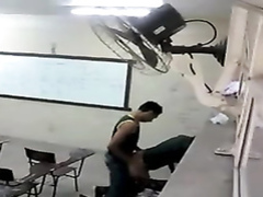 Doggystyle quickie in a lecture hall caught on camera