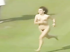 Female streaker runs across the stadium