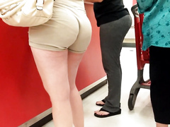 Khaki shorts fit her ass like a second skin