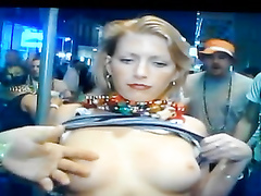 Slow motion flash of sexy tits at Mardi Gras