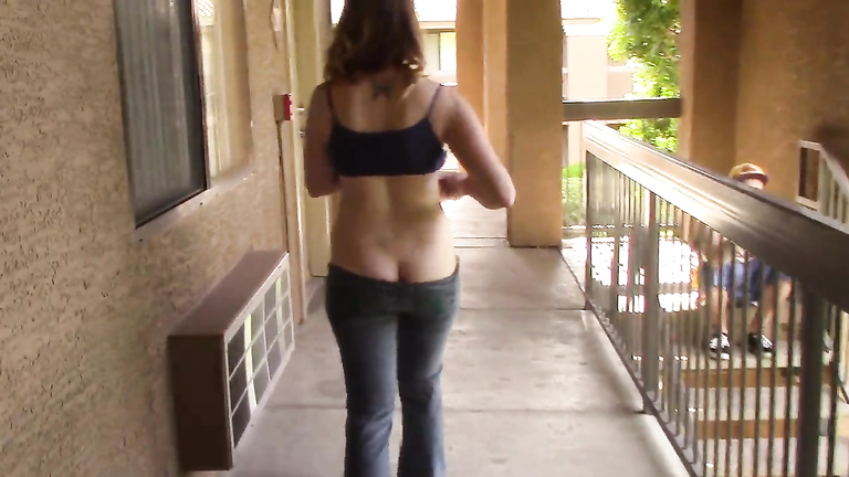 Chick flashing her tits and ass at the apartment complex