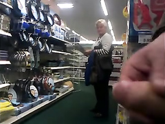 Stroking the pecker inside the store