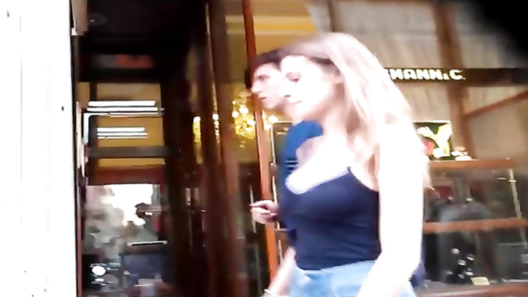 Great boobs in a tight tank top on the sidewalk