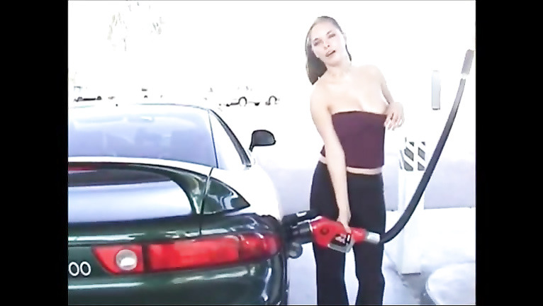 Pretty lady exposes her boobies at the gas station