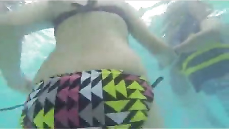 Fantastic female ass under the water