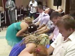 Russian bridesmaids in dresses and heels play a naughty game