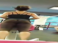 Fit beauty with an incredible ass in brown spandex