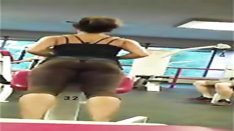Fit beauty with an incredible ass in brown spandex