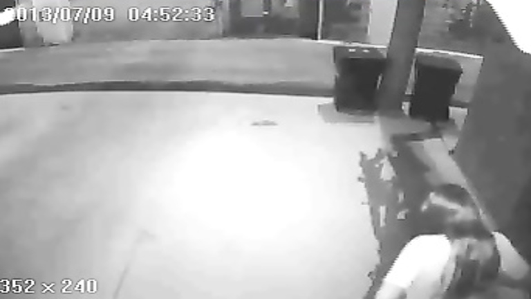 Her long piss is caught on security cam