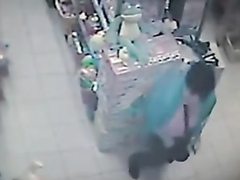 Woman pees on the floor in a store