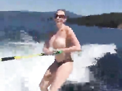 Topless chick in the water skiing adventure