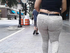 Plump bottom going through the streets