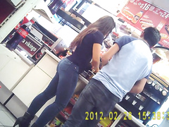 Tight jeans make for a fine Brazilian booty at the store