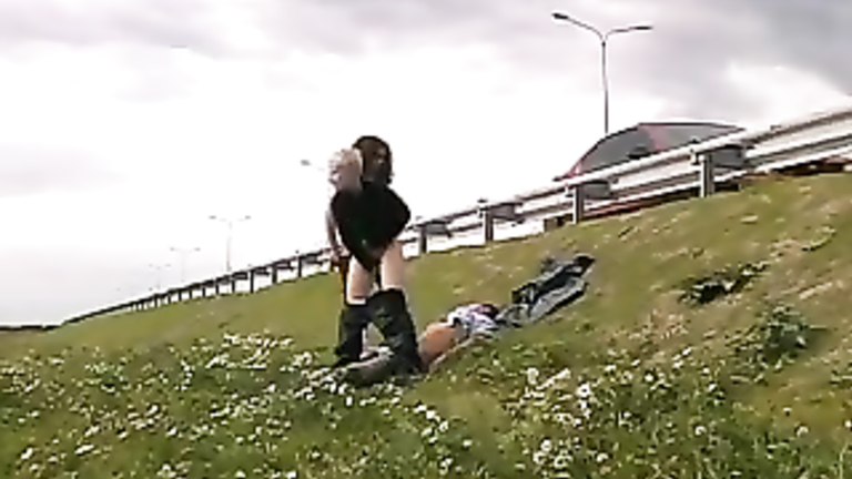 Girls beat up a guy and ride him by the highway