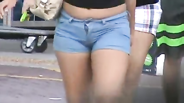 Bootylicious chicks in shorts in a parking lot