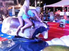 Bimbos in panties ride the mechanical bull together