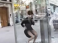 Sexy lady flashes her pussy in a phone booth