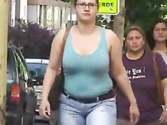 Big bouncy boobs on a British woman walking the street