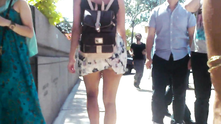 Following a short dress cutie through the city