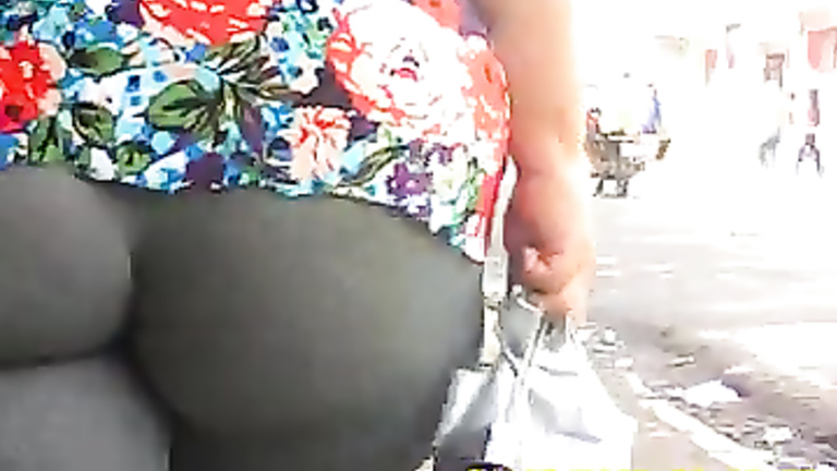 Black BBW ass exposed as she walks down the street