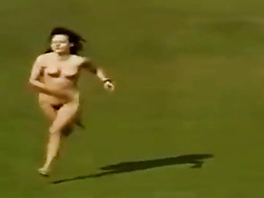 Naked woman streaks across the pitch