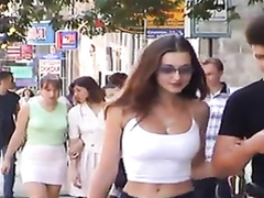 Scantily clad women in the city on a spring day