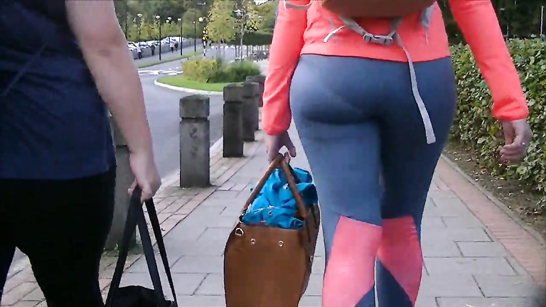 Blue spandex pants hug her sexy big ass