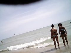 Capturing a quick shot of bikini girls in the water
