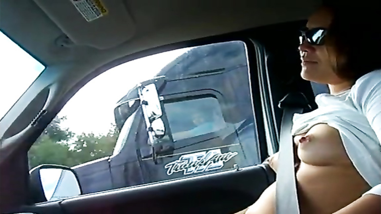 Wife demonstrates her perky tits to the trucker