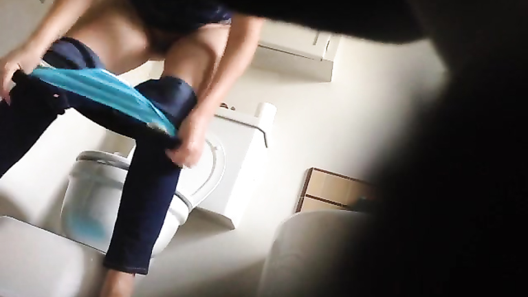 Sister's friend gets taped while taking a long piss in the bathroom