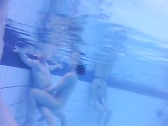 Nudists in the pool get filmed underwater