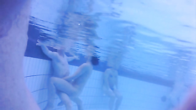 Nudists in the pool get filmed underwater