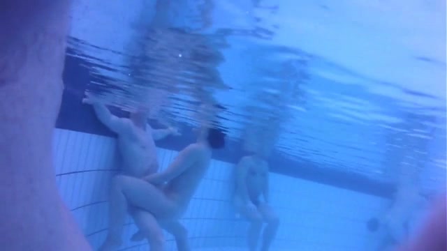 Fantastic asses underwater at a nudist pool