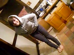 Playful cutie in a hoodie pisses her jeans